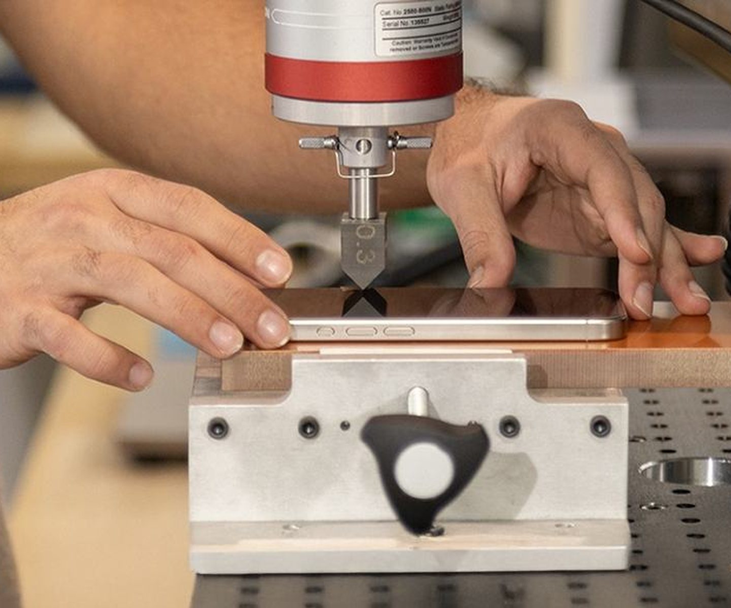A screen protector being tested in a lab